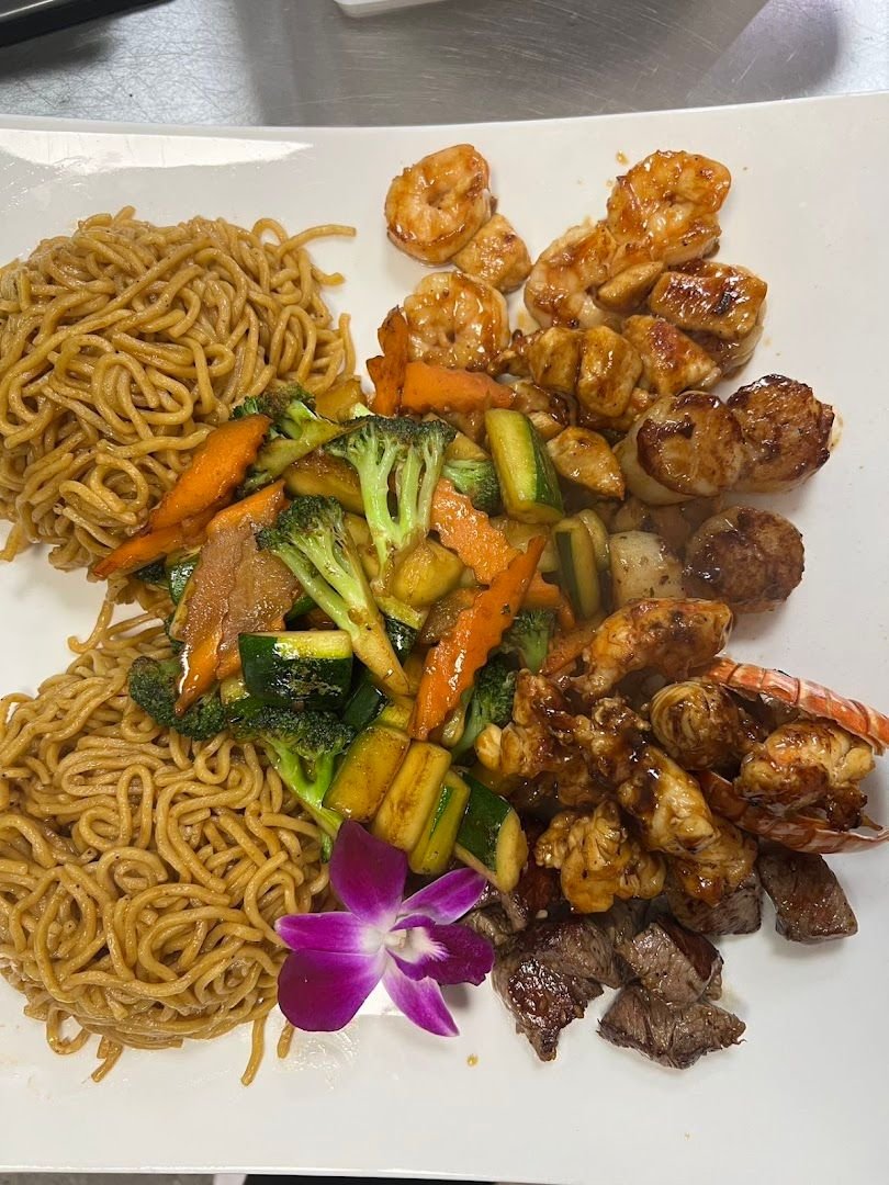 A hibachi combination with vegetables, noodles, fried rice and seafood at Red Plum